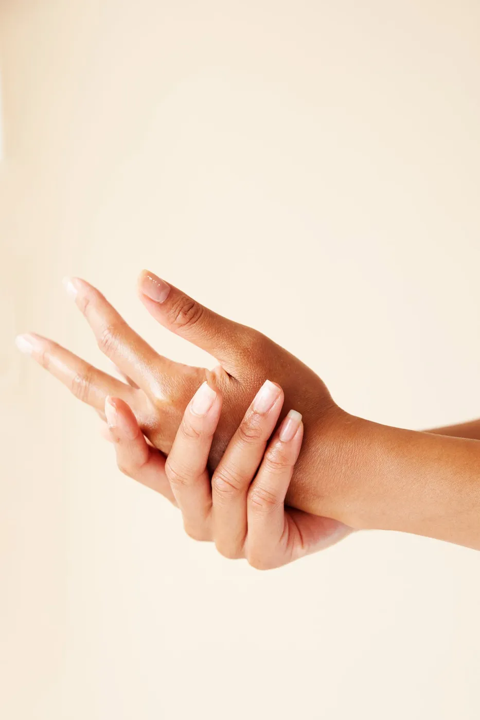 Two Hands Running In Skincare Treatment